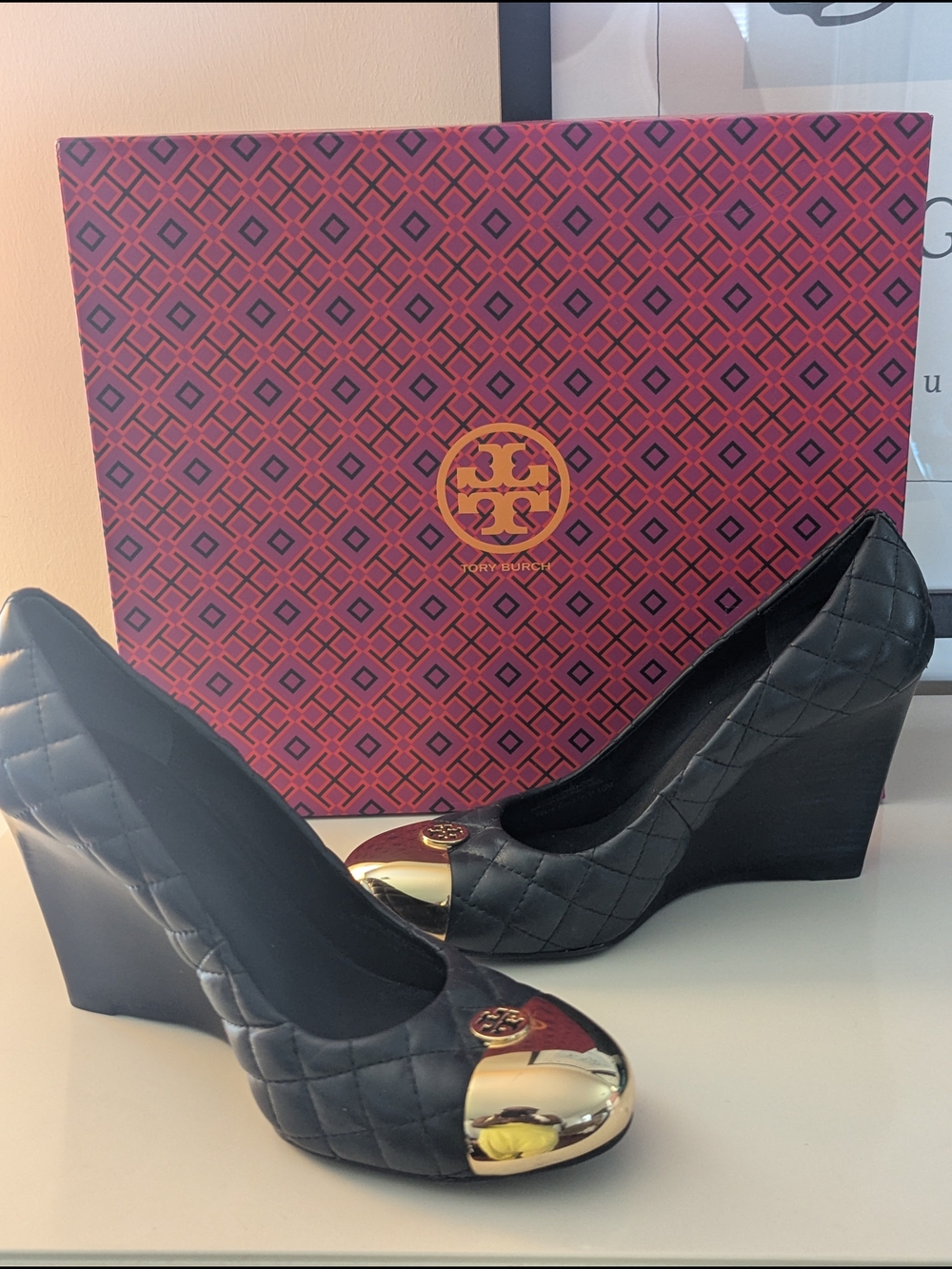 Tory Burch Black Quilted Wedge Pumps with Gold Cap Toe